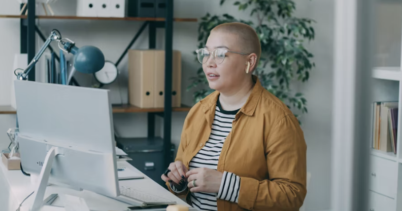 A person reviewing information at their computer.